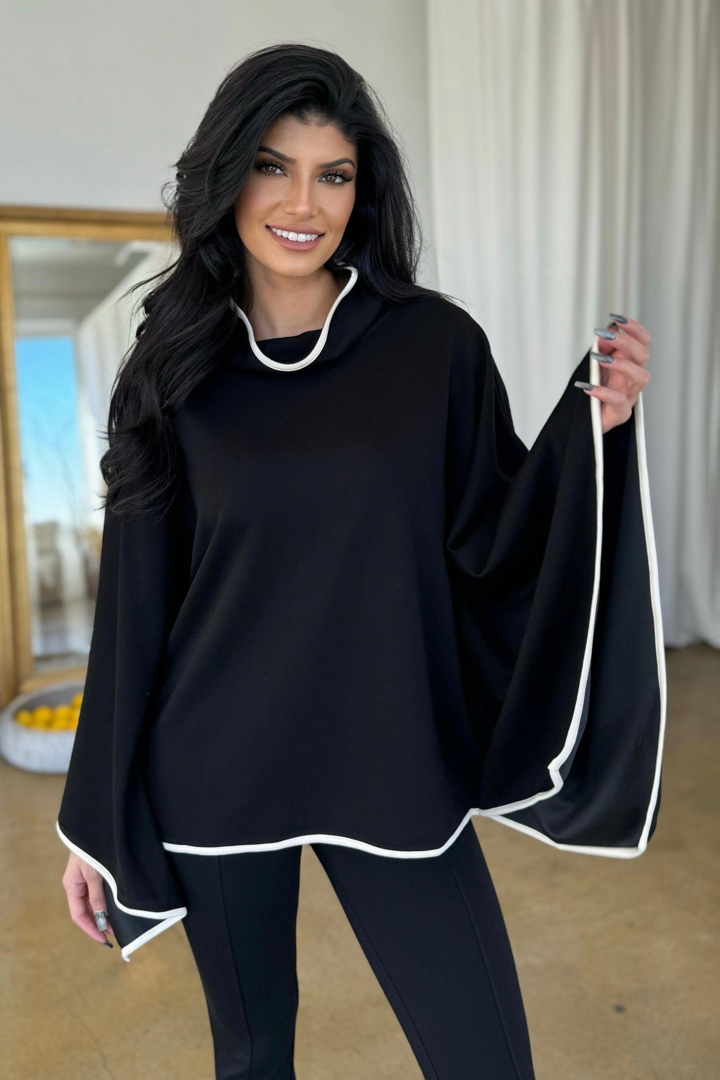 FLORENCE PONCHO SWEATER , poncho , It's NOMB , BLACK PONCHO, BLACK SCUBA FABRIC PONCHO, DRESSY BLACK PONCHO WITH WHITE PIPING, poncho sweater, TURTLENECK PONCHO , It's NOMB , itsnomb.com